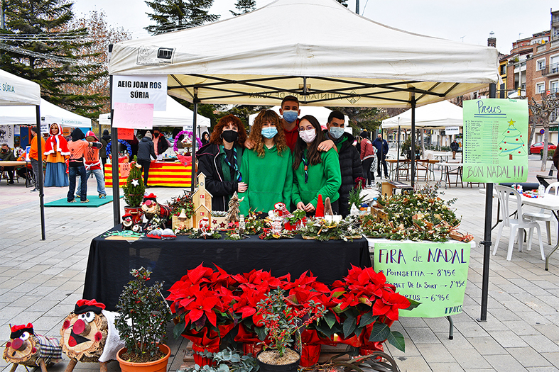 Parada de l'Agrupament Escolta i Guia Joan Ros a la Fira d’Entitats i Fira de Nadal de Súria.