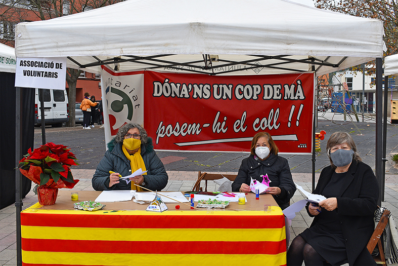 Parada de l'Associació de Voluntaris a la Fira d’Entitats i Fira de Nadal de Súria.